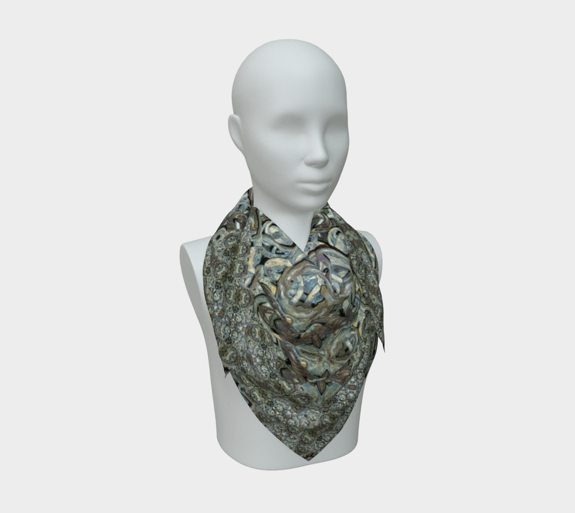 Front mannequin view of the Grail Night Hoard Virtus 8.2 Silk Art Scarf in pale blue-gray, cream, olive, charcoal and copper-rust, with large interlocking scrolls and organic knot forms edged by pale blue-gray arcs, arranged in a compact pointed drape.