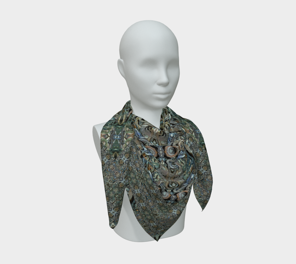Three-quarter mannequin view of the Grail Night Hoard Virtus 8.8 Silk Art Scarf in gray, silver gray, charcoal gray, pale cyan, arranged in a loose cowl with layered points and large curling knotwork and calligraphic loop forms.