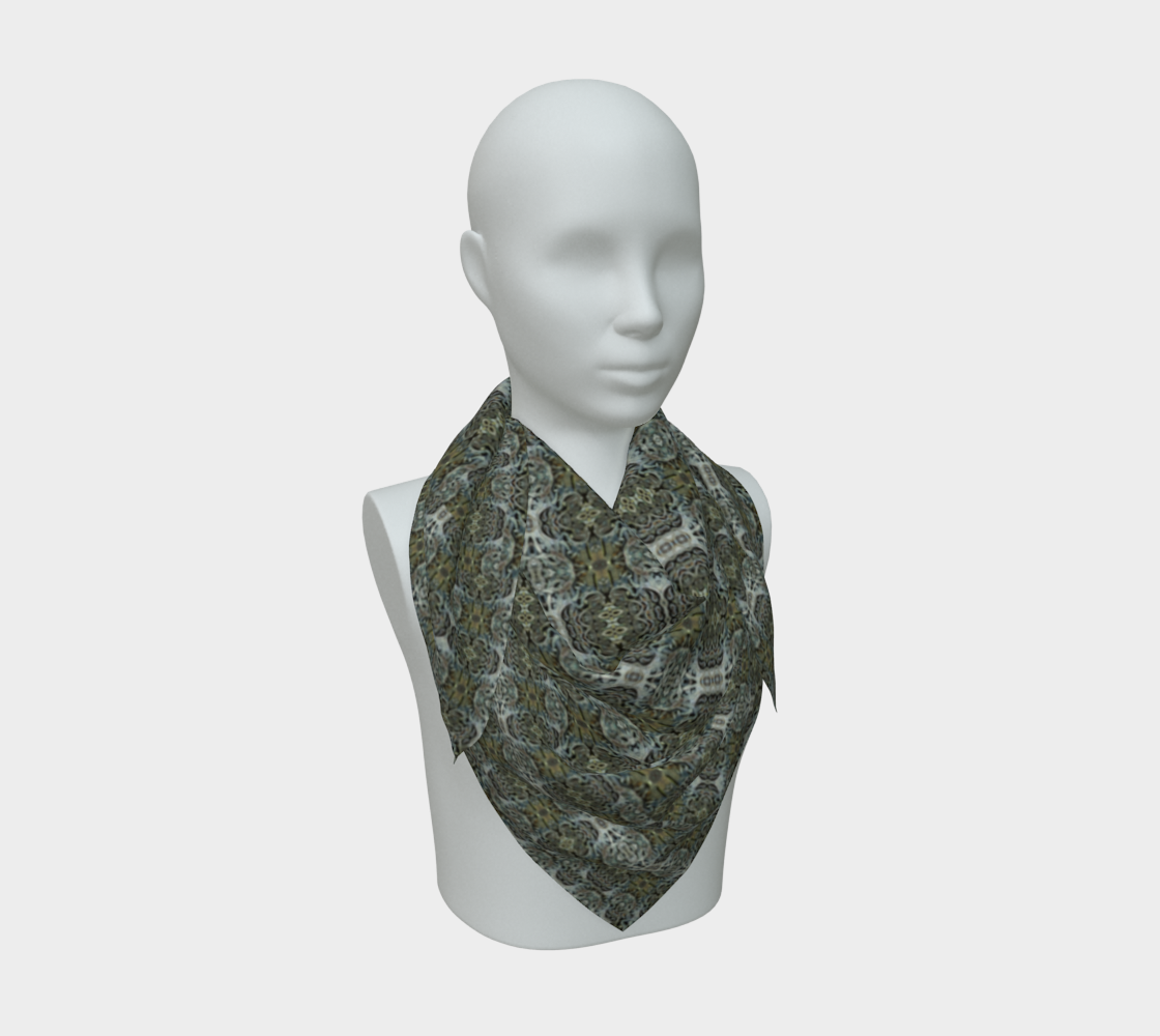 Front mannequin view of the Grail Night Hoard Virtus 8.6 Silk Art Scarf in gray, silver gray, charcoal gray, pale cyan, wrapped close with a centered pointed fall and small linked chain medallions.