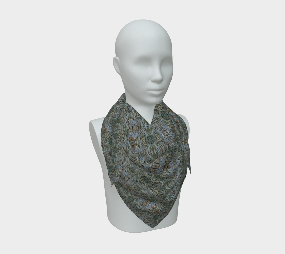 Front mannequin view of the Grail Night Hoard Virtus 8.4 Silk Art Scarf in gray-green, charcoal, pale blue-gray, muted rust and cream, with small star and rosette medallions repeated in disciplined vertical columns, arranged in a compact pointed drape.