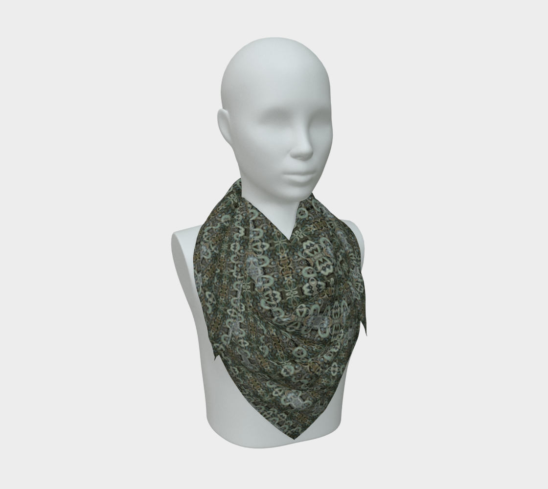 Front mannequin view of the Grail Night Hoard Virtus 8.7 Silk Art Scarf in gray, silver gray, charcoal gray, pale cyan, wrapped close with a centered pointed fall and small linked rings and chain-like medallions.