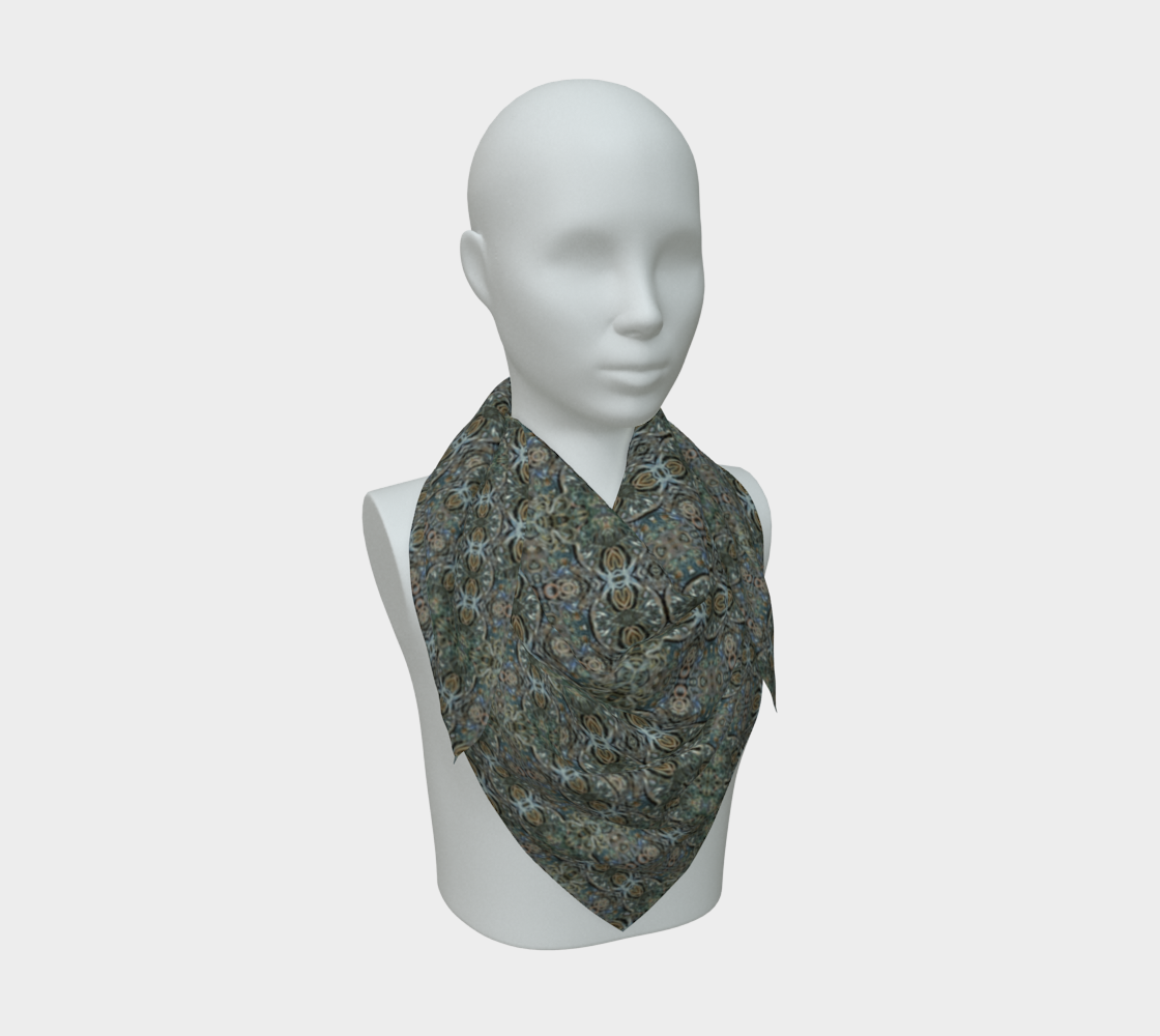 Front mannequin view of the Grail Night Hoard Virtus 8.8 Silk Art Scarf in gray, silver gray, pale cyan, charcoal gray, wrapped close with a centered pointed fall and small linked rosettes and loop cells.