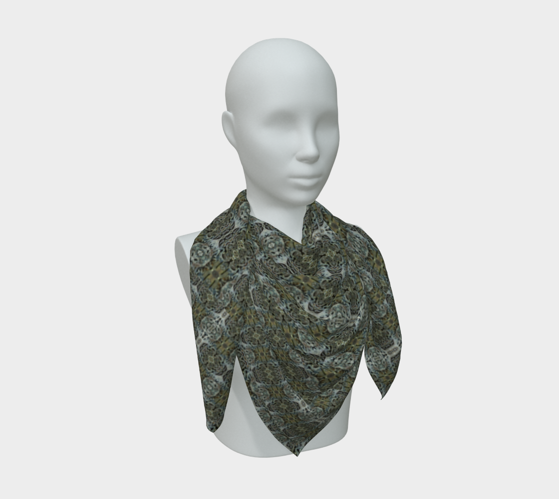 Three-quarter mannequin view of the Grail Night Hoard Virtus 8.6 Silk Art Scarf in gray, silver gray, charcoal gray, deep yellow, arranged in a loose cowl with layered points and small linked chain medallions.