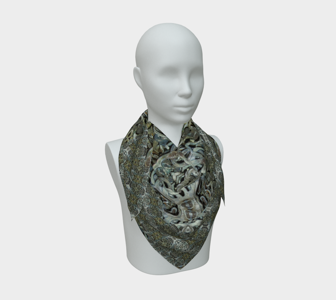 Front mannequin view of the Grail Night Hoard Virtus 8.6 Silk Art Scarf in gray, silver gray, charcoal gray, pale cyan, wrapped close with a centered pointed fall and angular branching ornaments and compact geometric knots.