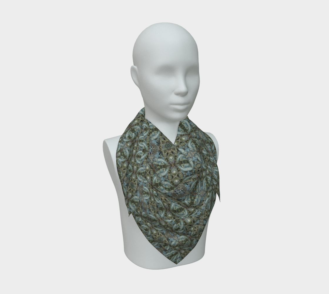 Front mannequin view of Endless Oval Column Matrix Silk Art Scarf, with blue-gray and teal-gray oval loops compressed into a compact pointed drape.
