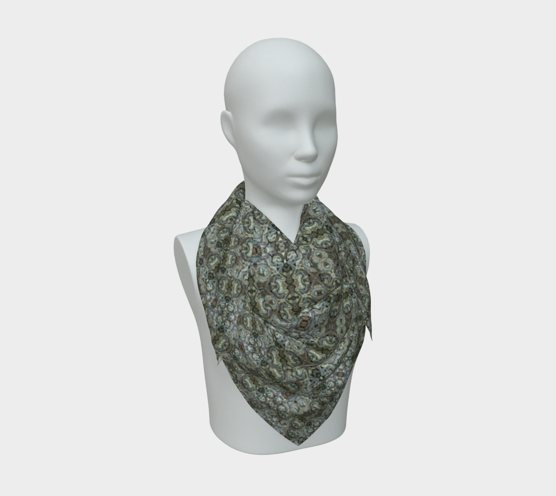 Front mannequin view of the Grail Night Hoard Virtus 8.2 Silk Art Scarf in gray-green, charcoal, cream, muted copper and pale blue-gray, with tiny linked ring and rosette medallions repeated across the full square, arranged in a compact pointed drape.