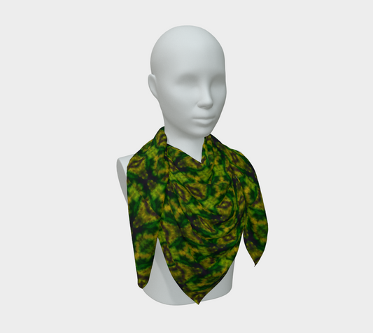 Green, yellow-gold, and muted violet Purely Jade Light silk art scarf draped on a mannequin, showing a denser diamond-repeat field by RJSTH.